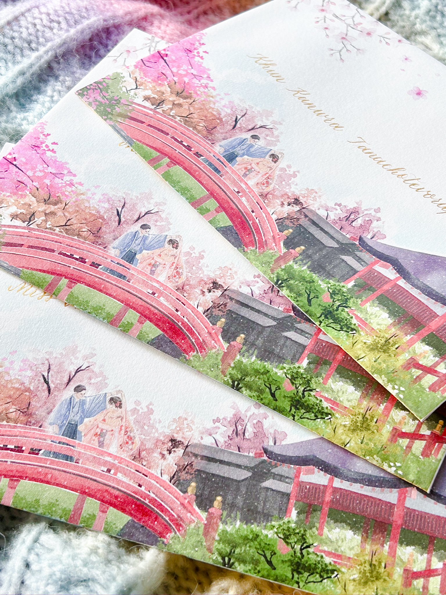 Gold calligraphy wedding invitation with cherry blossom watercolour illustration